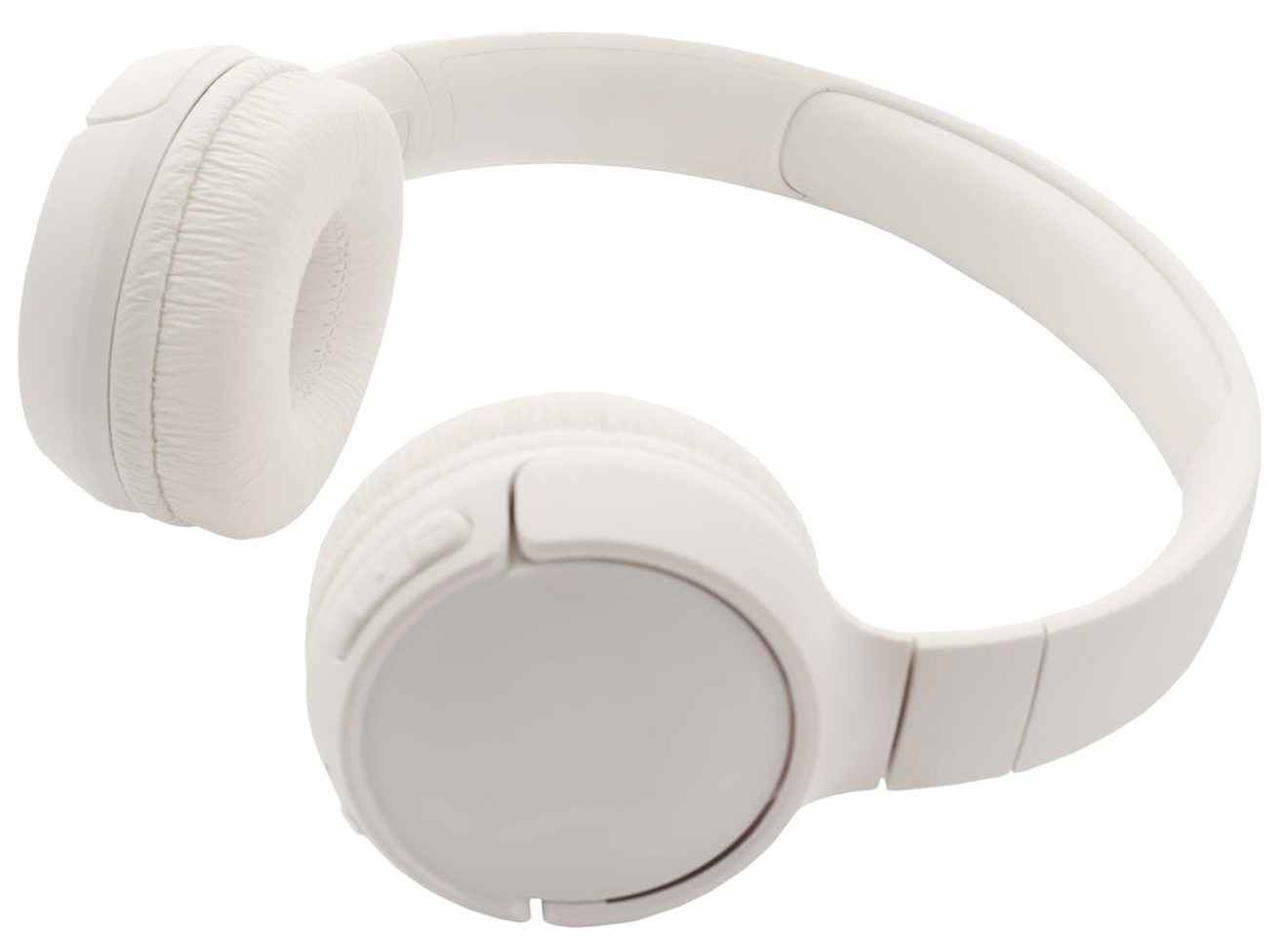 white headphones listening to stock music